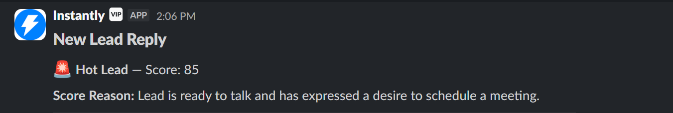 Slack notification showing new positive reply with lead details